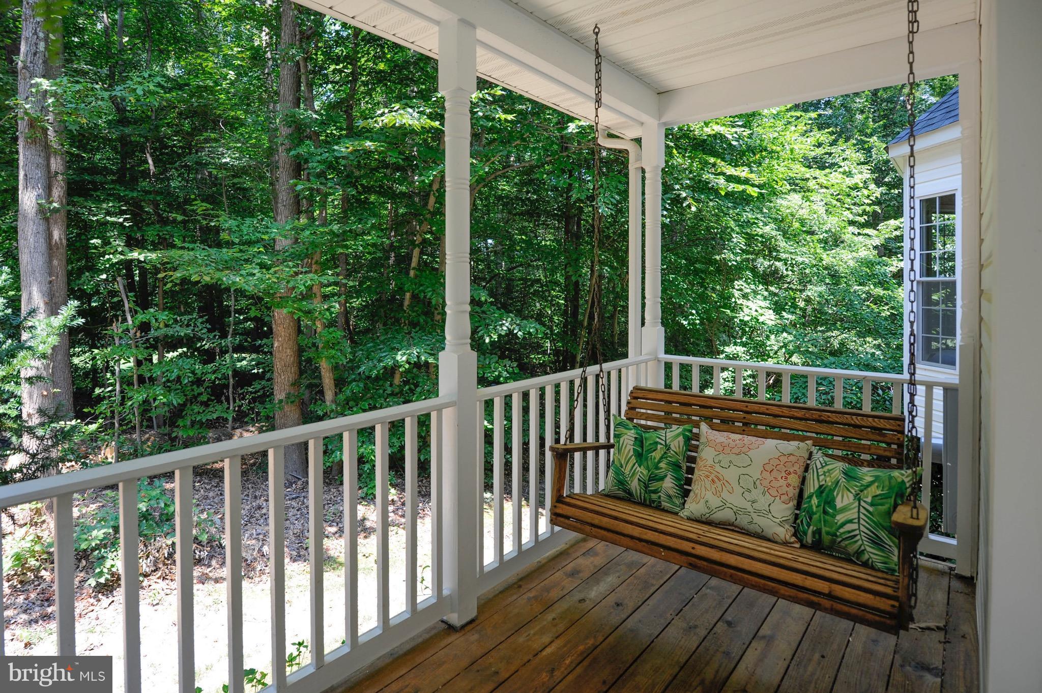 885 Carson Road Huntingtown, MD 20639 - Photo 3 of 30 a view of a balcony with wooden floor
