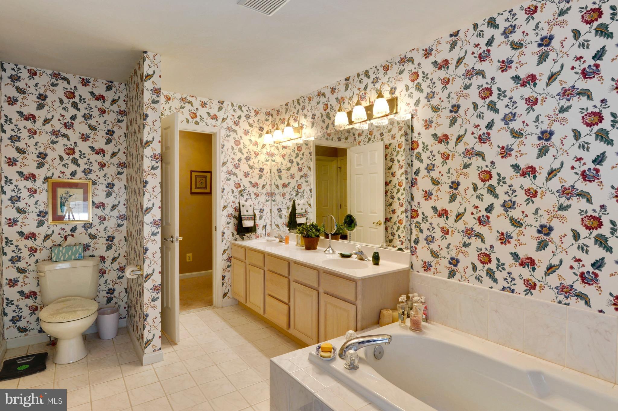 885 Carson Road Huntingtown, MD 20639 - Photo 21 of 30 a bathroom with a sink toilet and shower