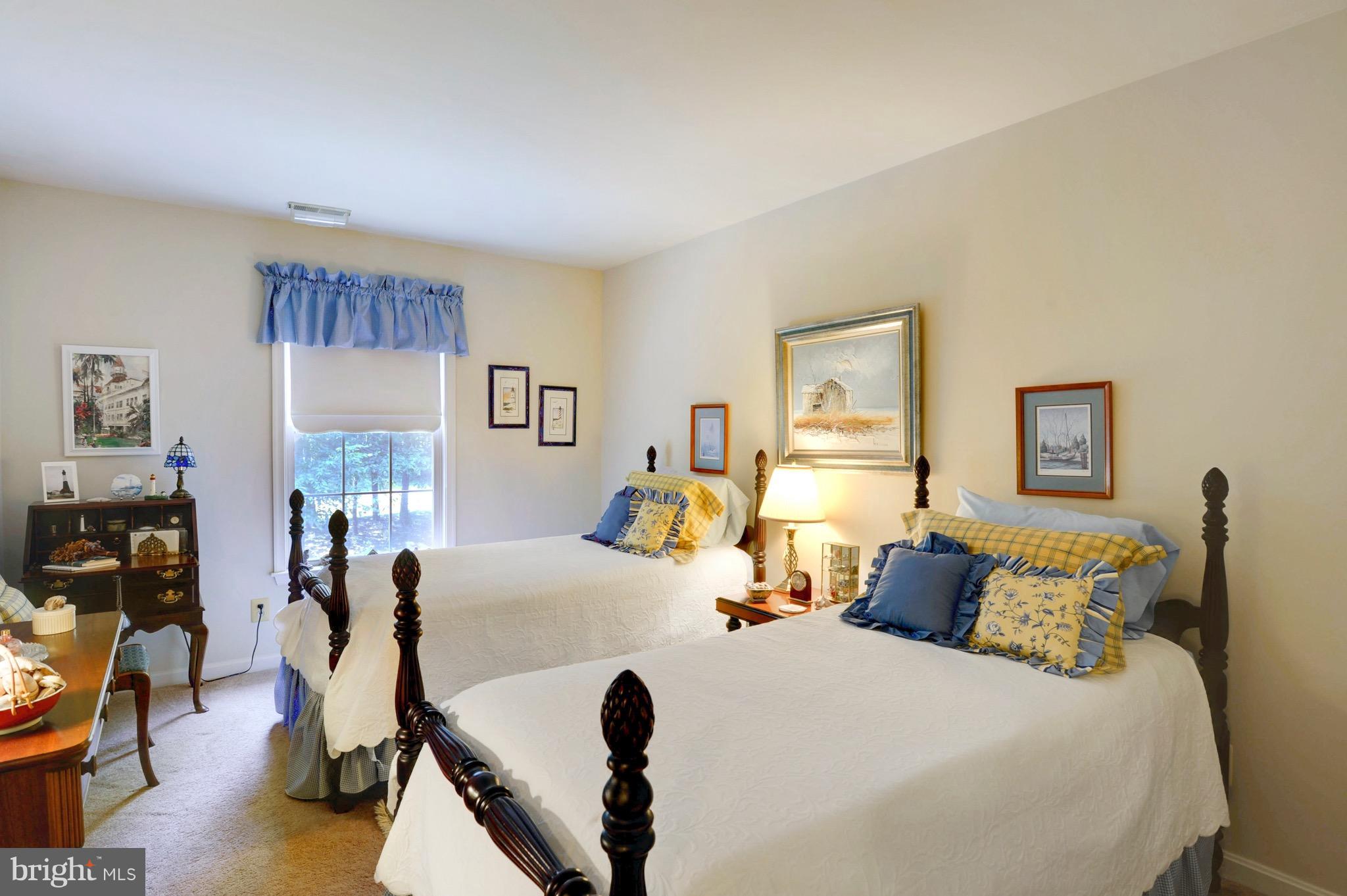 885 Carson Road Huntingtown, MD 20639 - Photo 24 of 30 a bedroom with a bed and wooden floor