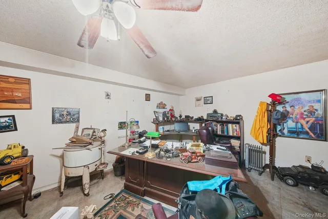 a living room with furniture and a area