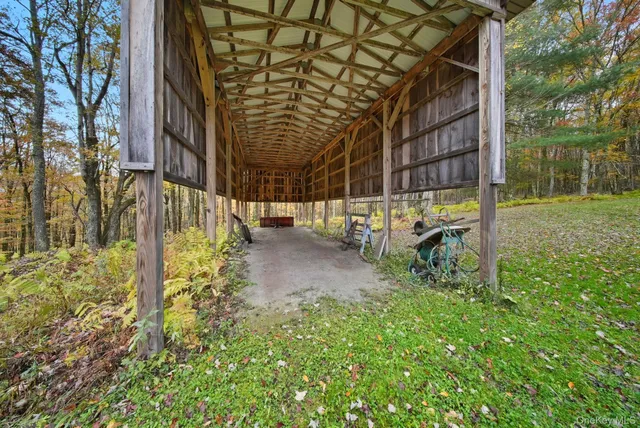 a view of yard with patio