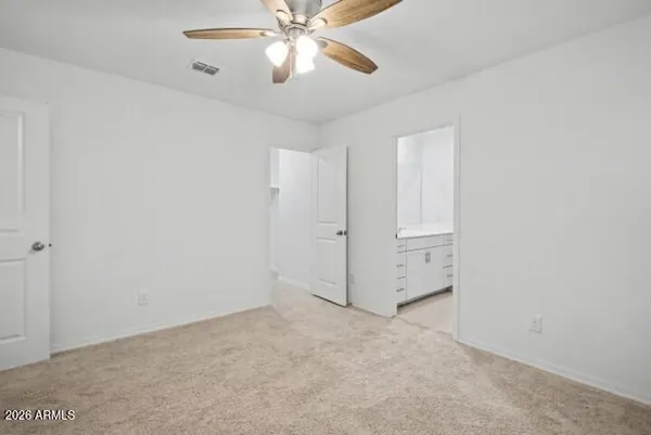 a bathroom with a sink vanity and a mirror