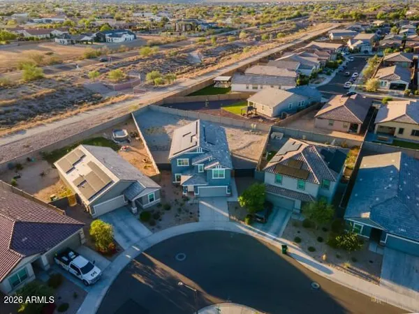 an aerial view of a house with stairs