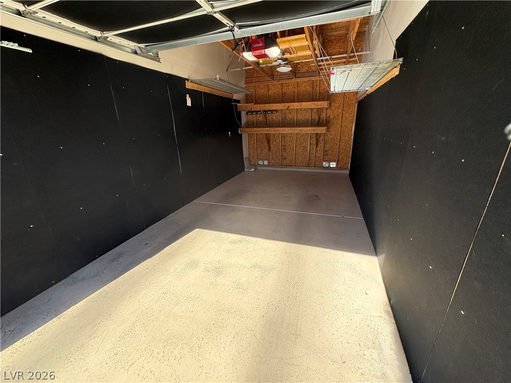 1685 Strasbourg Way, Unit 1685 Henderson, NV 89014 - Photo 20 of 22 Garage with a garage door opener