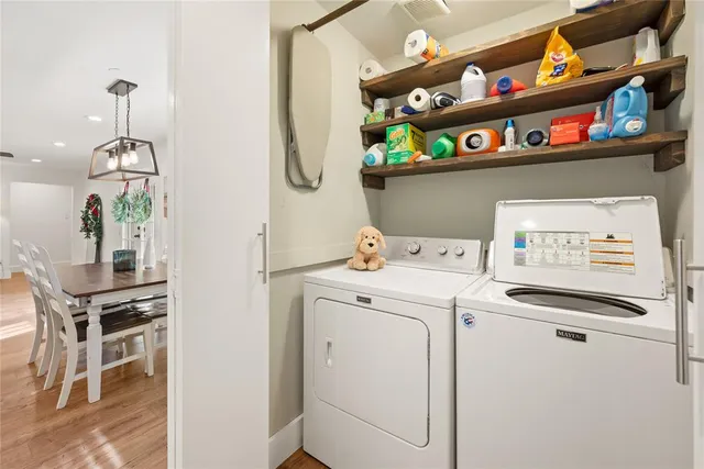a utility room with dryer and washer