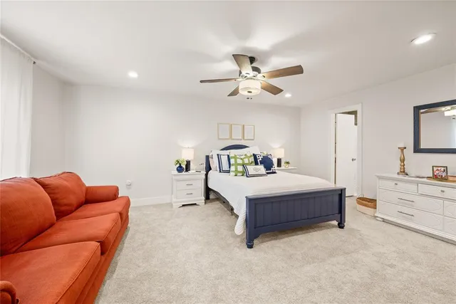 a bedroom with furniture and window