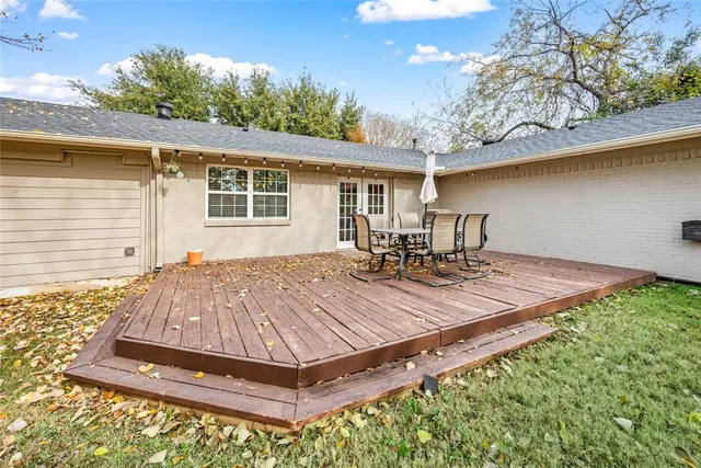 a front view of house with yard space and seating area