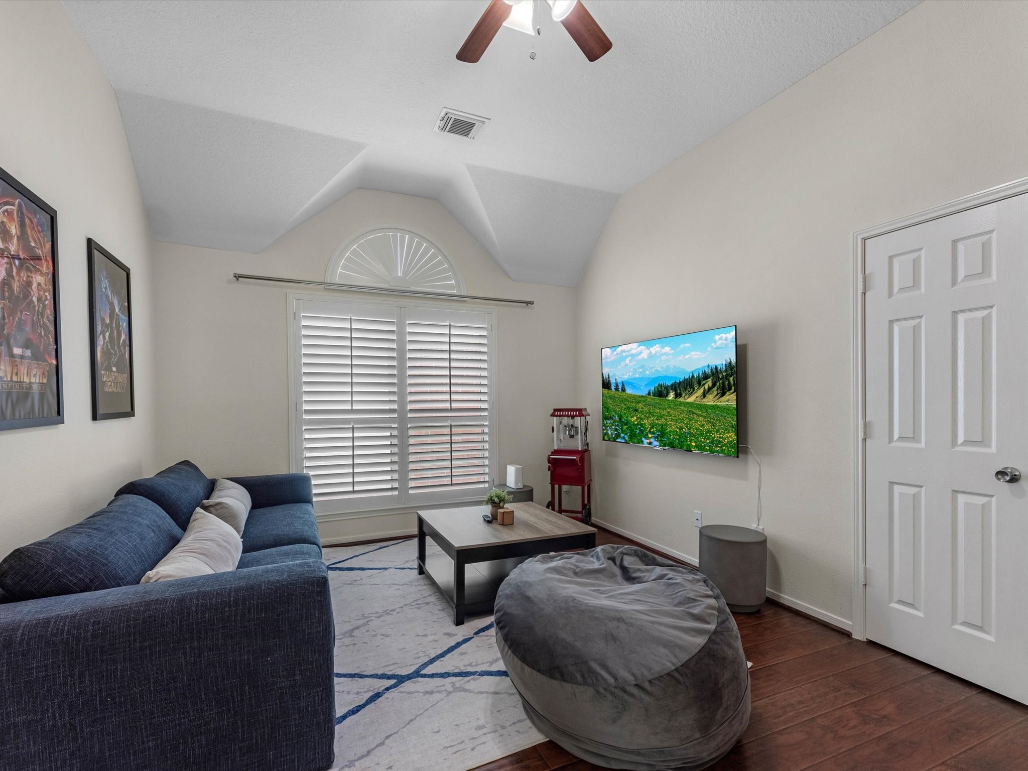 14003 Stardust Lane Houston, TX 77041 - Photo 16 of 30 a living room with furniture and a flat screen tv