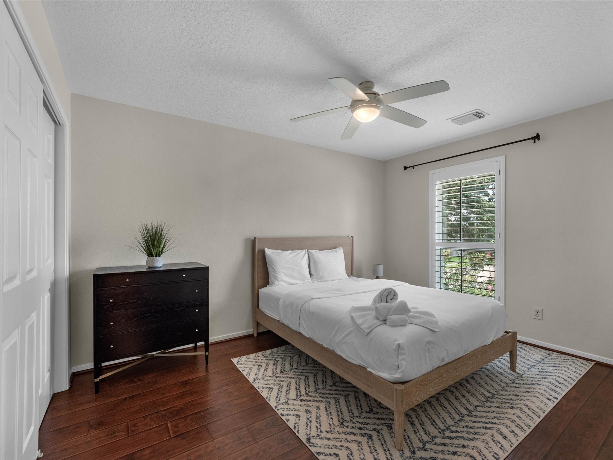 14003 Stardust Lane Houston, TX 77041 - Photo 24 of 30 a bed room with a bed and a window