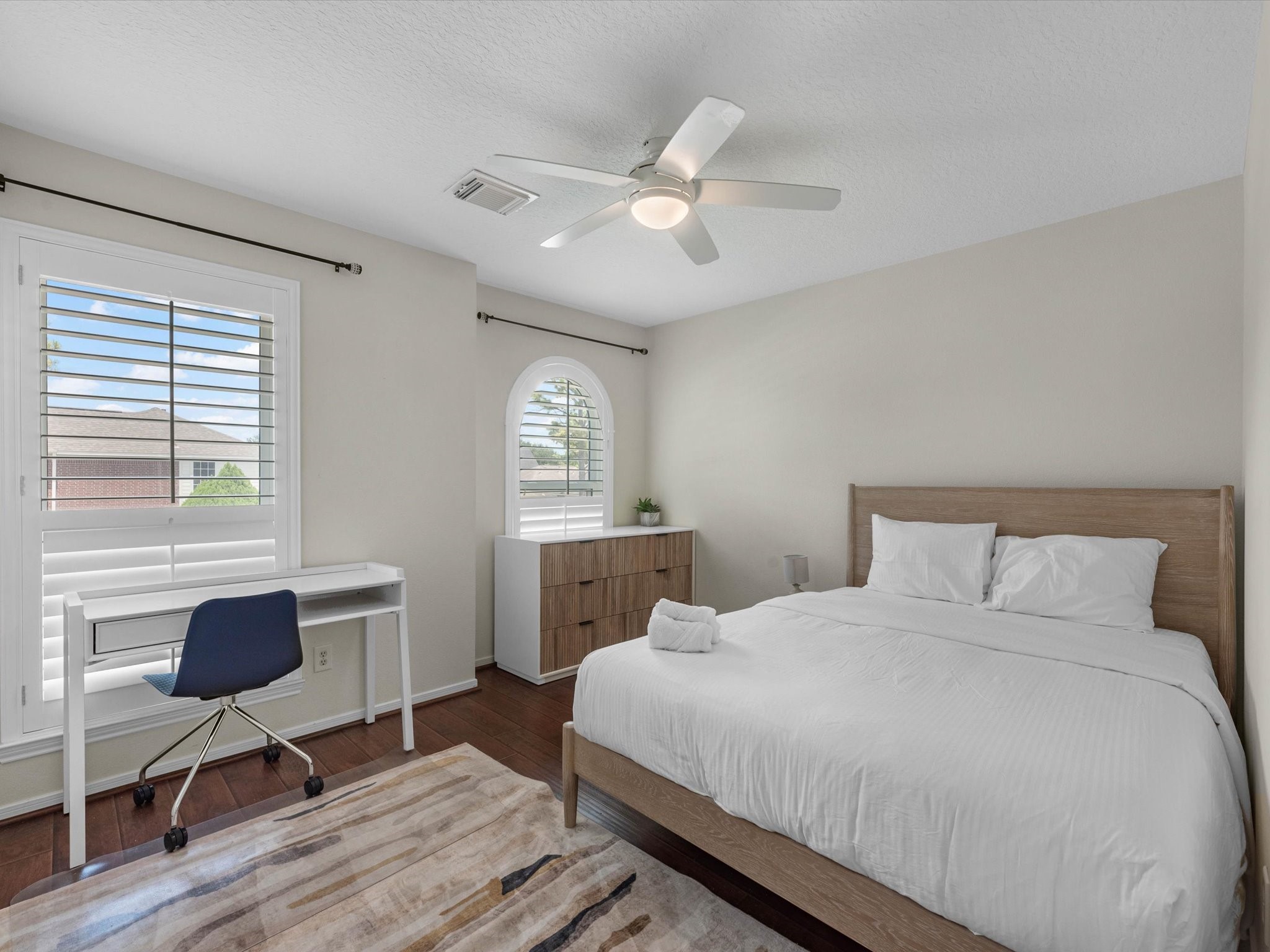 14003 Stardust Lane Houston, TX 77041 - Photo 26 of 30 a bedroom with a bed and a window