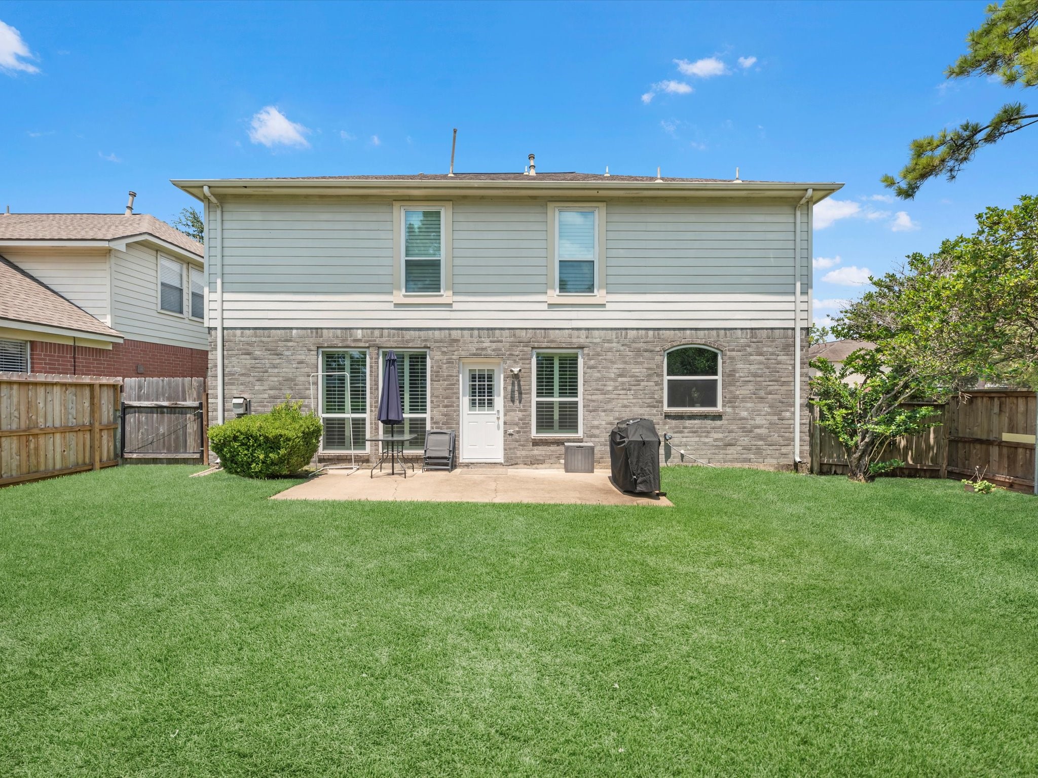 14003 Stardust Lane Houston, TX 77041 - Photo 28 of 30 a view of a house with backyard sitting area and garden