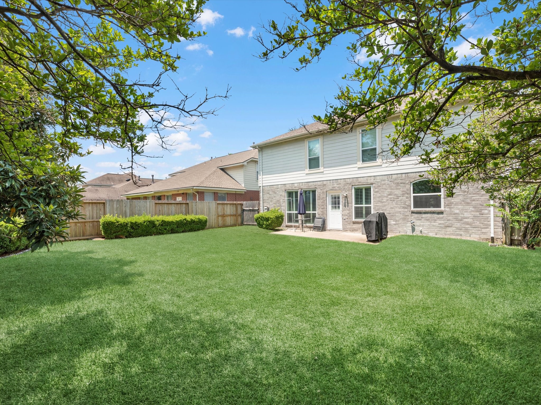 14003 Stardust Lane Houston, TX 77041 - Photo 29 of 30 a front view of a house with a garden