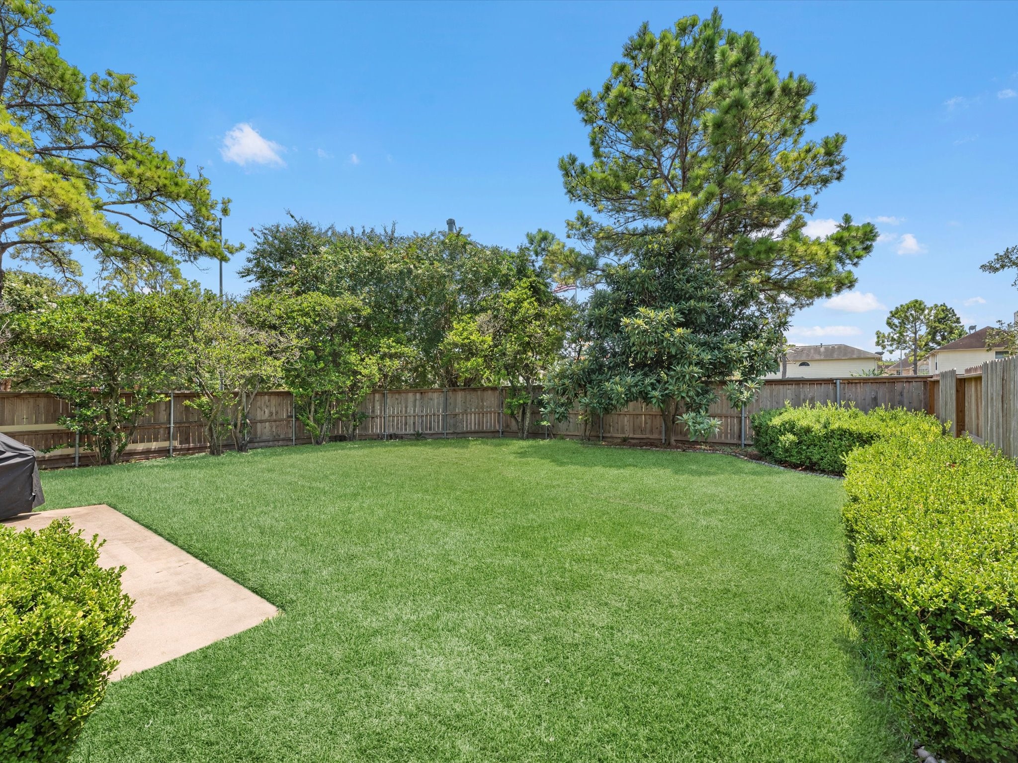 14003 Stardust Lane Houston, TX 77041 - Photo 30 of 30 a view of a backyard with a garden