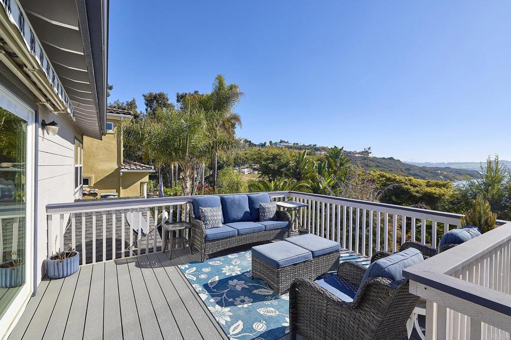 4235 Harrison Street Carlsbad, CA 92008 - Photo 12 of 55 a view of balcony with furniture and wooden deck