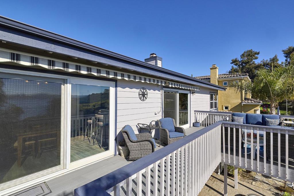 4235 Harrison Street Carlsbad, CA 92008 - Photo 14 of 55 a view of a balcony with chairs