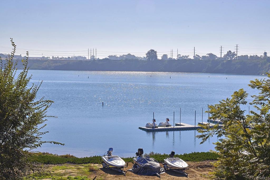 4235 Harrison Street Carlsbad, CA 92008 - Photo 18 of 55 a view of a lake with a car parked on the terrace