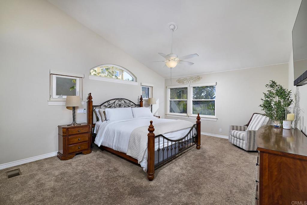 4235 Harrison Street Carlsbad, CA 92008 - Photo 23 of 55 a spacious bedroom with a bed and a window