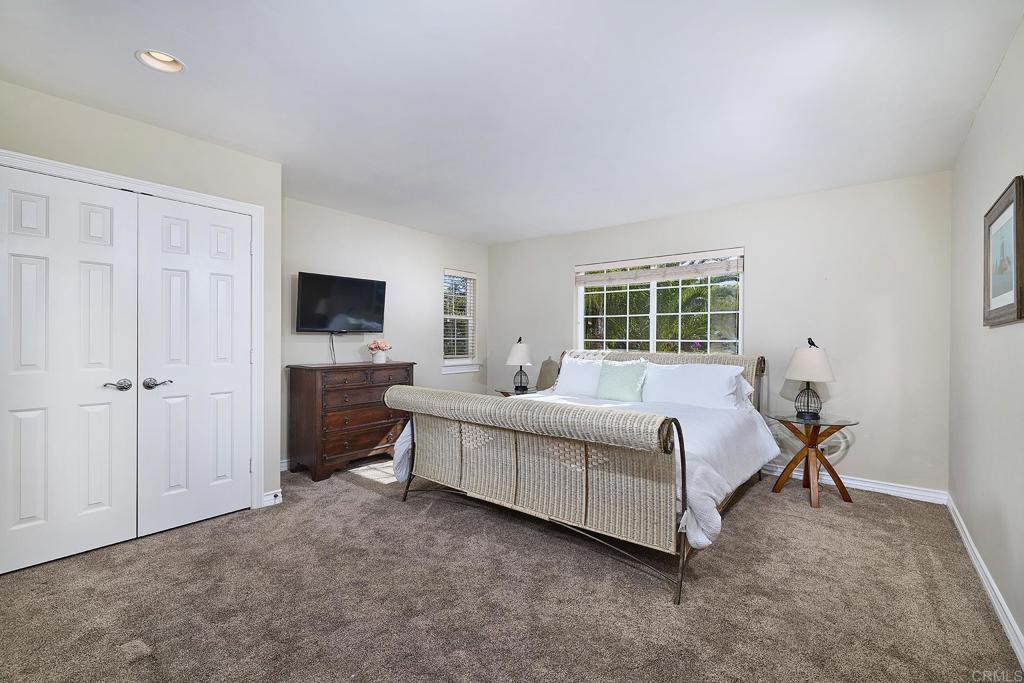 4235 Harrison Street Carlsbad, CA 92008 - Photo 28 of 55 a bed room with a bed television and a window