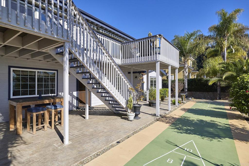 4235 Harrison Street Carlsbad, CA 92008 - Photo 37 of 55 a view of a house with wooden deck
