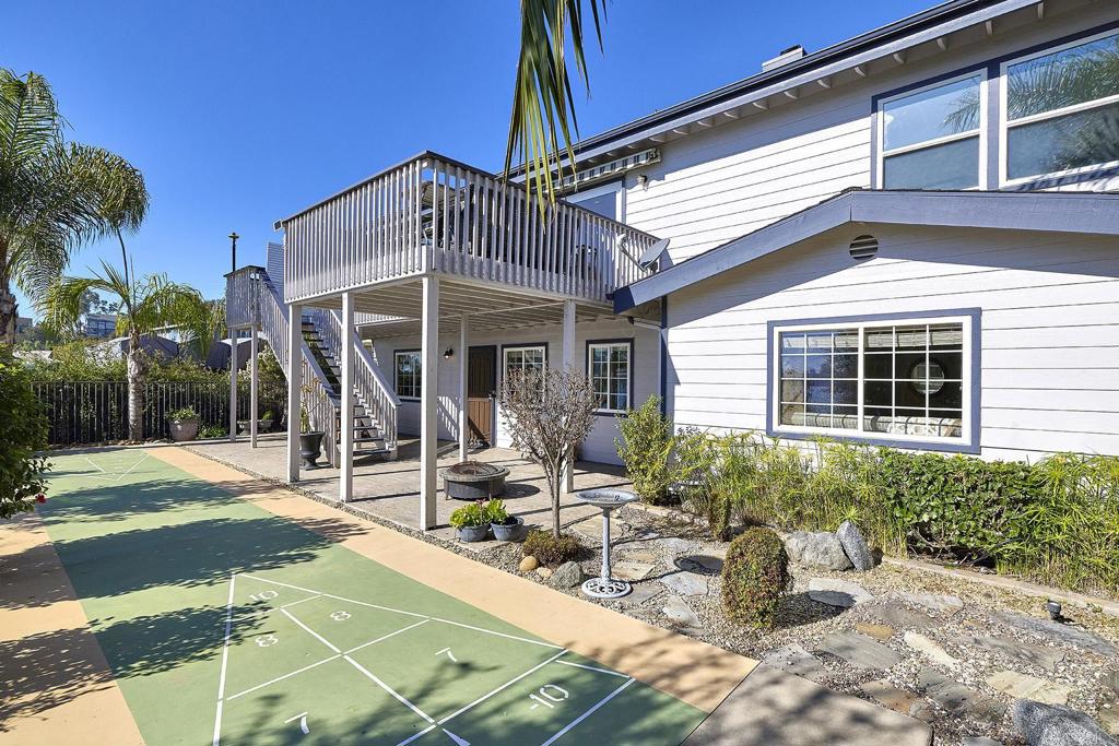 4235 Harrison Street Carlsbad, CA 92008 - Photo 39 of 55 a view of a house with backyard and sitting area