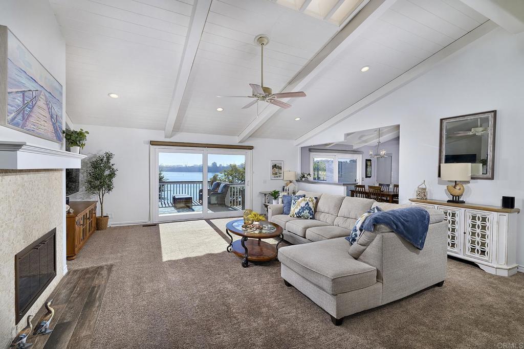4235 Harrison Street Carlsbad, CA 92008 - Photo 4 of 55 a living room with furniture and a fireplace