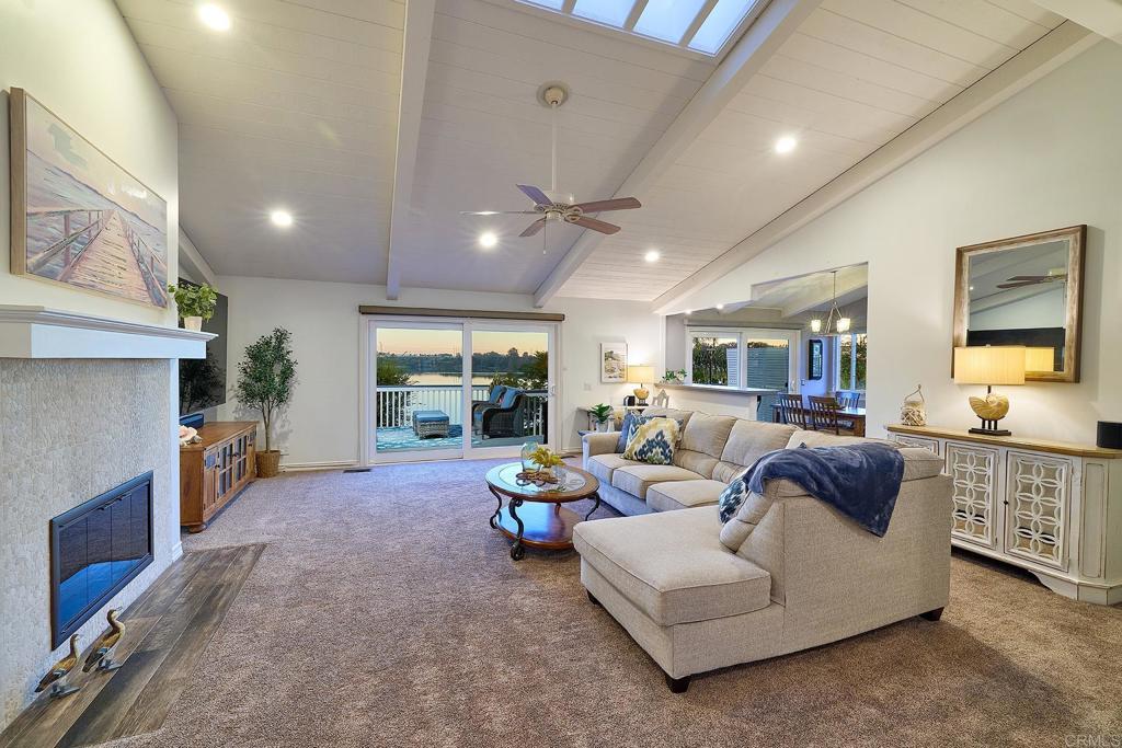 4235 Harrison Street Carlsbad, CA 92008 - Photo 44 of 55 a living room with furniture and a fireplace