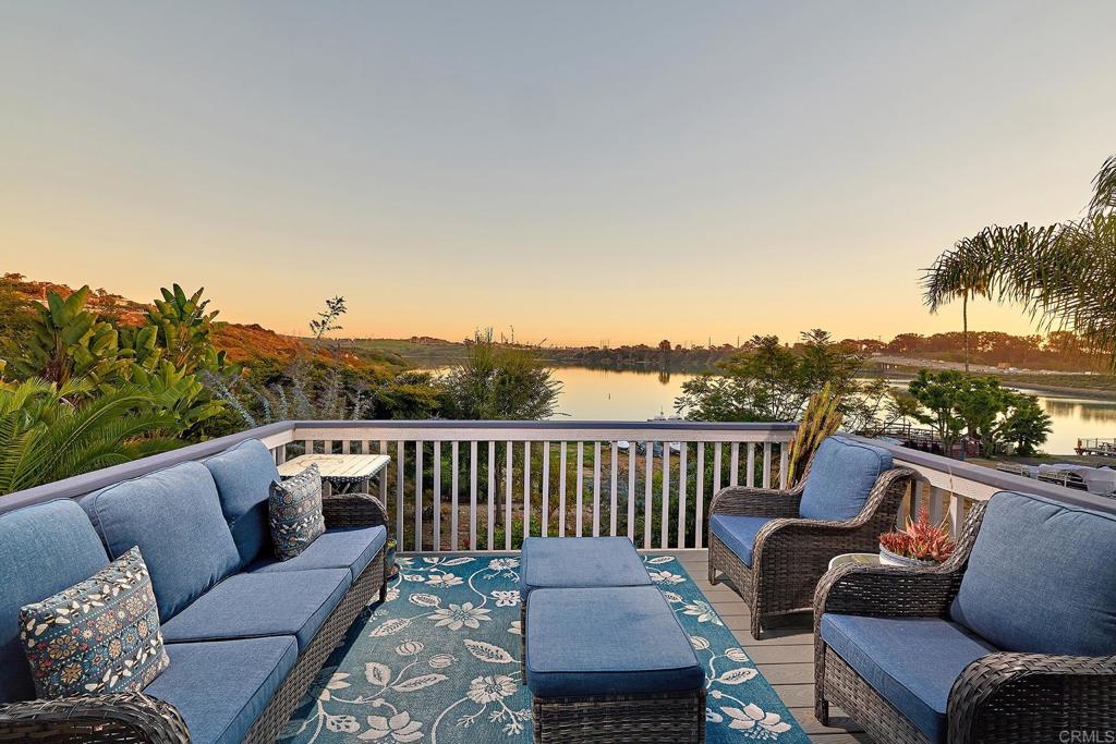 4235 Harrison Street Carlsbad, CA 92008 - Photo 48 of 55 a roof deck with couches and wooden floor