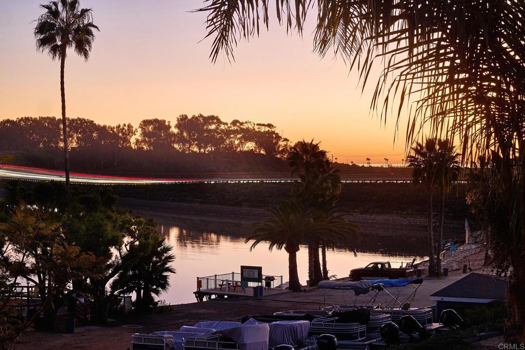 4235 Harrison Street Carlsbad, CA 92008 - Photo 52 of 55 a view of a terrace with a table and chairs under an umbrella