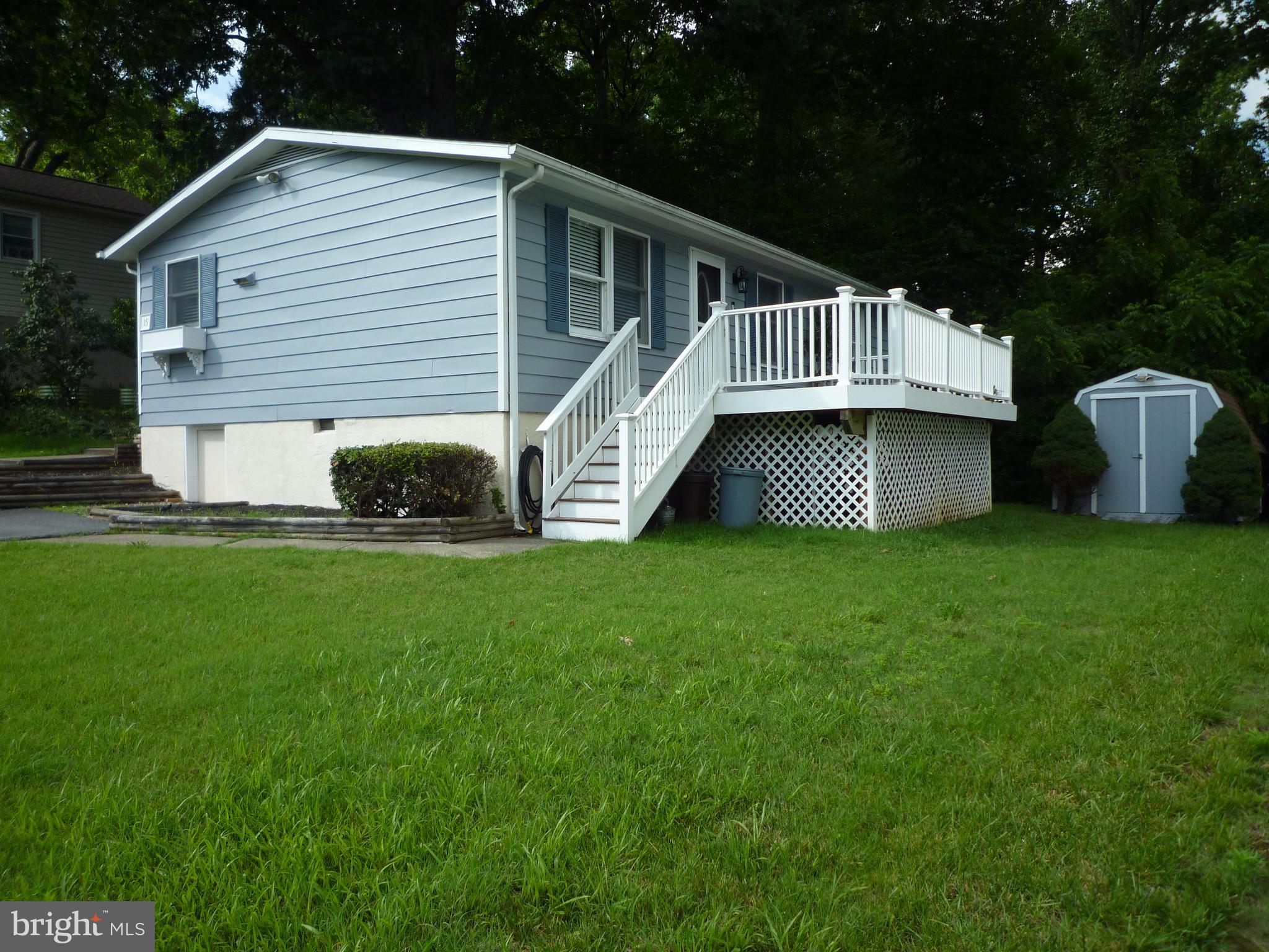 Front w/Side Deck and View to the Back Woods