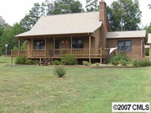 36627 Finger Road Mount Pleasant, NC 28124 - Photo 1 of 8 a front view of a house with a yard