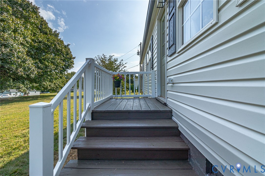 36 Bundick Road Lottsburg, VA 22511 - Photo 31 of 50 Front porch with wood-finish decking, white railin