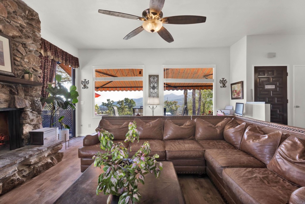 15866 Lyons Valley Road Jamul, CA 91935 - Photo 12 of 56 a living room with furniture and a large window