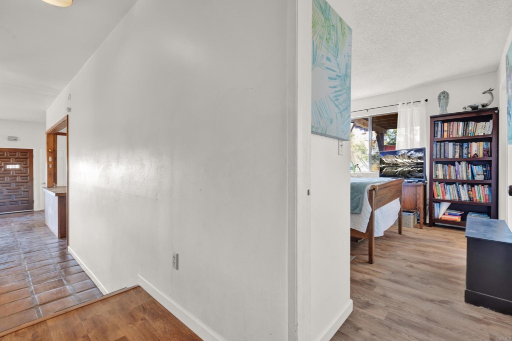 15866 Lyons Valley Road Jamul, CA 91935 - Photo 27 of 56 a view of a livingroom with furniture and hardwood floor