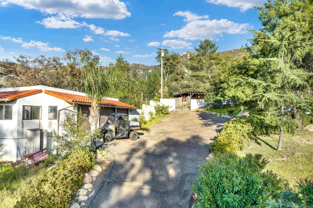 15866 Lyons Valley Road Jamul, CA 91935 - Photo 3 of 56 a view of a house with a yard