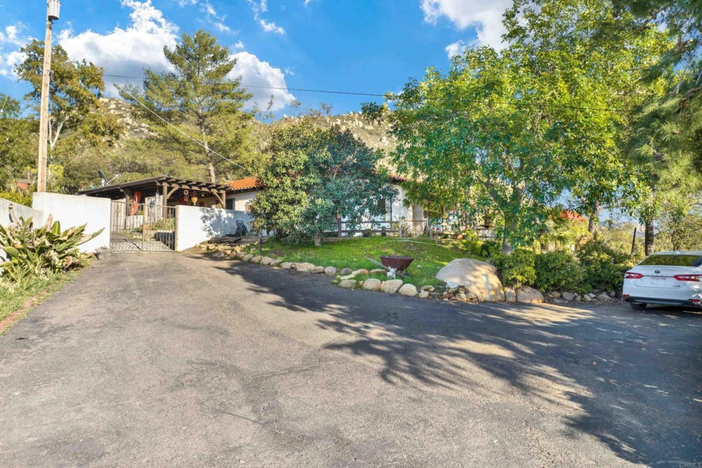 15866 Lyons Valley Road Jamul, CA 91935 - Photo 56 of 56 a view of a street with trees on both side of it