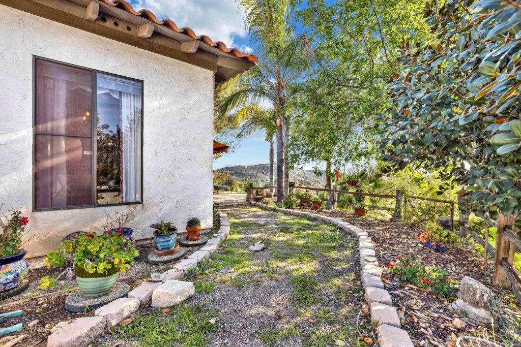 15866 Lyons Valley Road Jamul, CA 91935 - Photo 6 of 56 a front view of a house with a yard