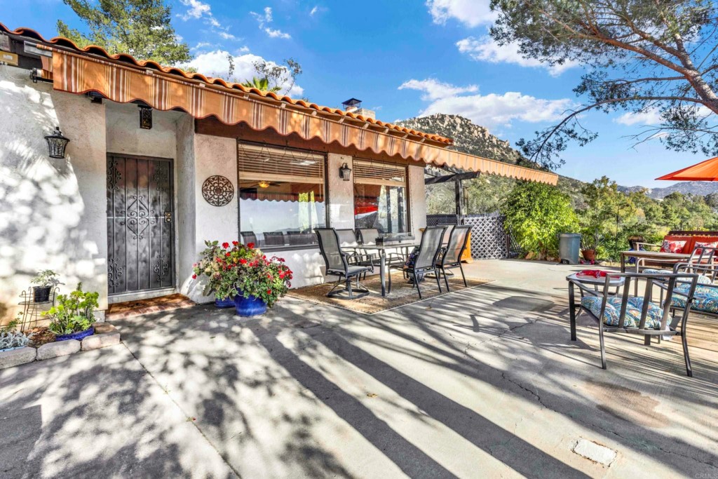 15866 Lyons Valley Road Jamul, CA 91935 - Photo 8 of 56 a view of a patio with table and chairs and potted plants