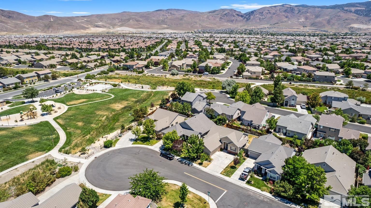 10160 Buckeye Court Reno, NV 89521 - Photo 26 of 36 an aerial view of residential houses with outdoor space and trees
