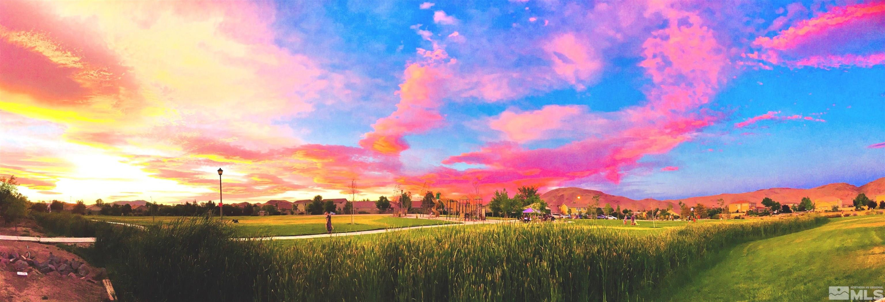 10160 Buckeye Court Reno, NV 89521 - Photo 27 of 36 a view of a lake with sunset