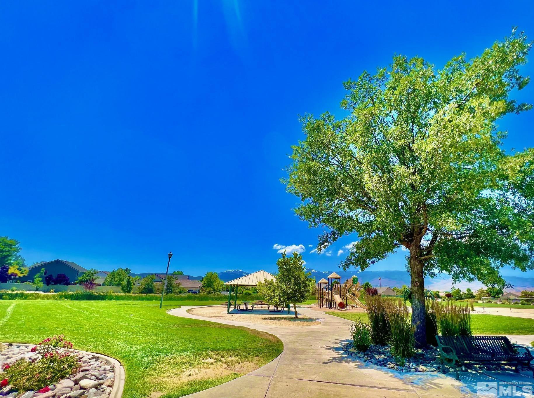 10160 Buckeye Court Reno, NV 89521 - Photo 30 of 36 a view of a golf course with a house