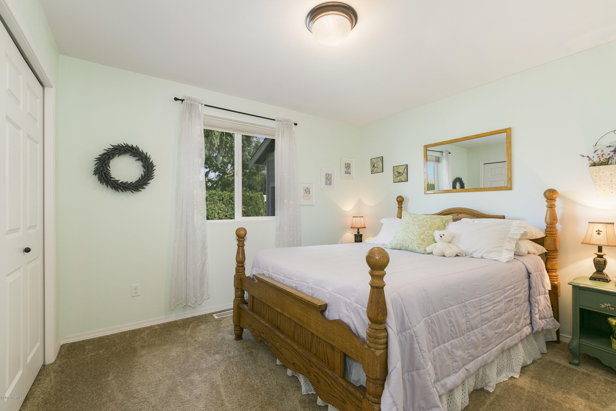 7997 Duffield Road Moxee, WA 98936 - Photo 14 of 29 a bed room with a bed and a window