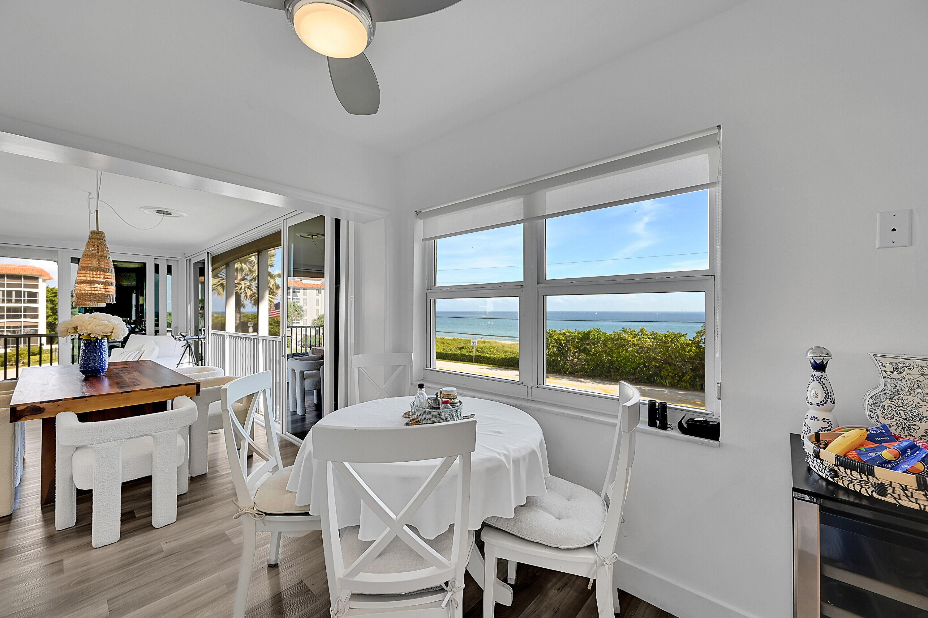 2871 North Ocean Boulevard, Unit D302 Boca Raton, FL 33431 - Photo 13 of 59 a view of a dining room with furniture window and outside view