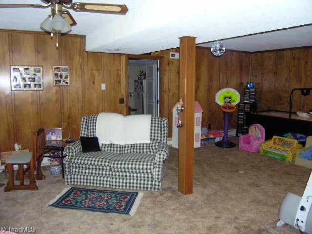 517 Whispering Creek Road King, NC 27021 - Photo 7 of 9 Other. Basement playroom