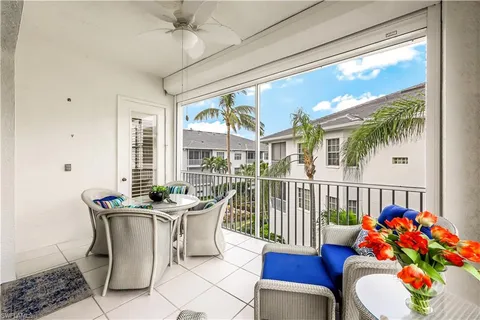 a outdoor dining space with furniture and garden view