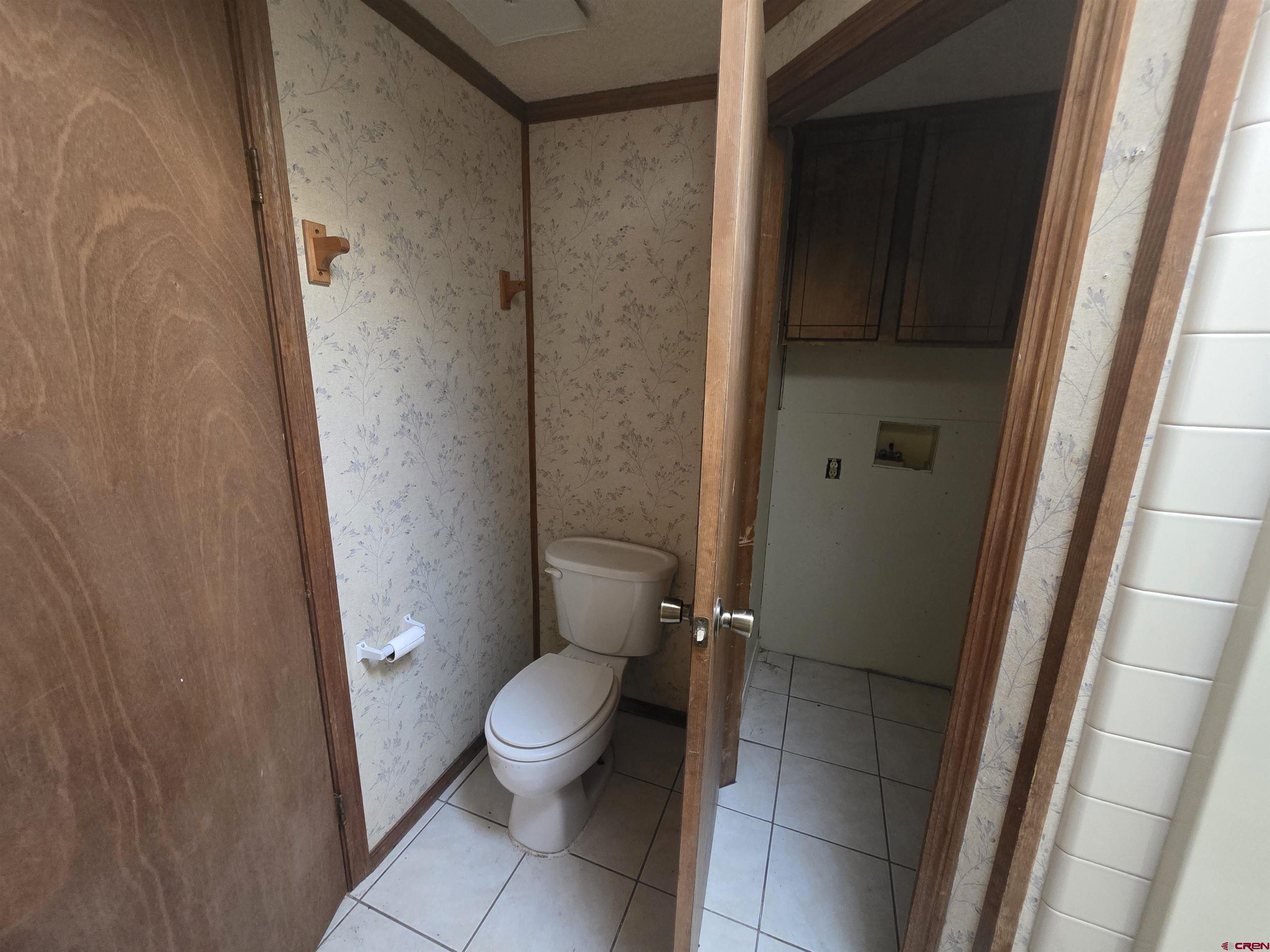 232D Arapahoe Road South Fork, CO 81154 - Photo 18 of 23 a bathroom with a toilet and a shower