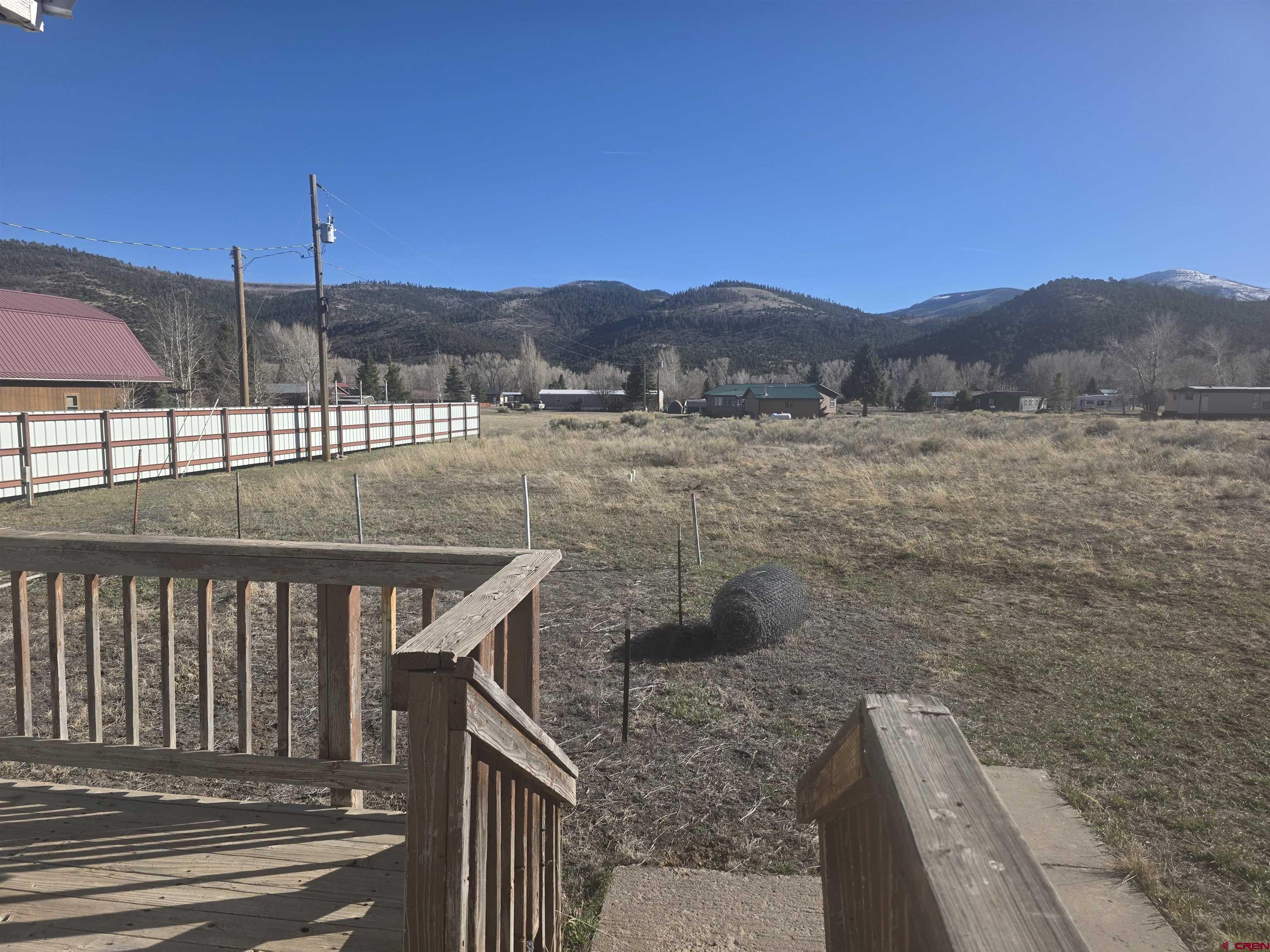 232D Arapahoe Road South Fork, CO 81154 - Photo 21 of 23 a view of a balcony with an outdoor space