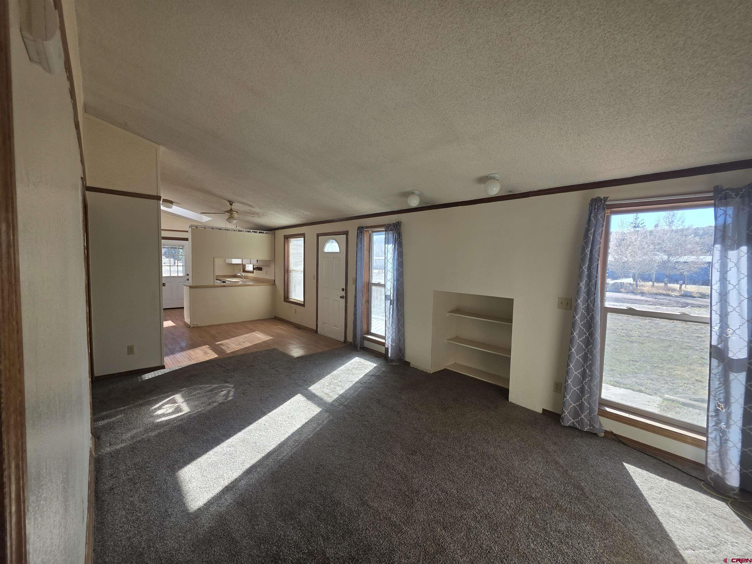 232D Arapahoe Road South Fork, CO 81154 - Photo 9 of 23 a view of workspace with window and stairs