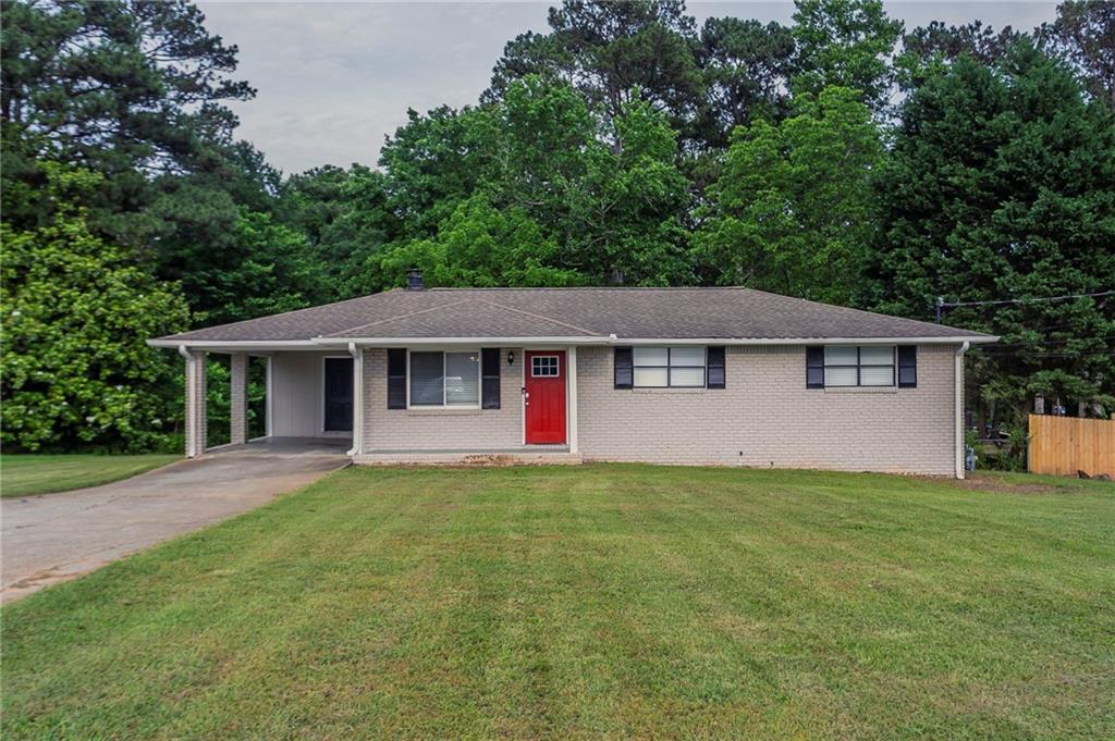 front view of a house with a big yard