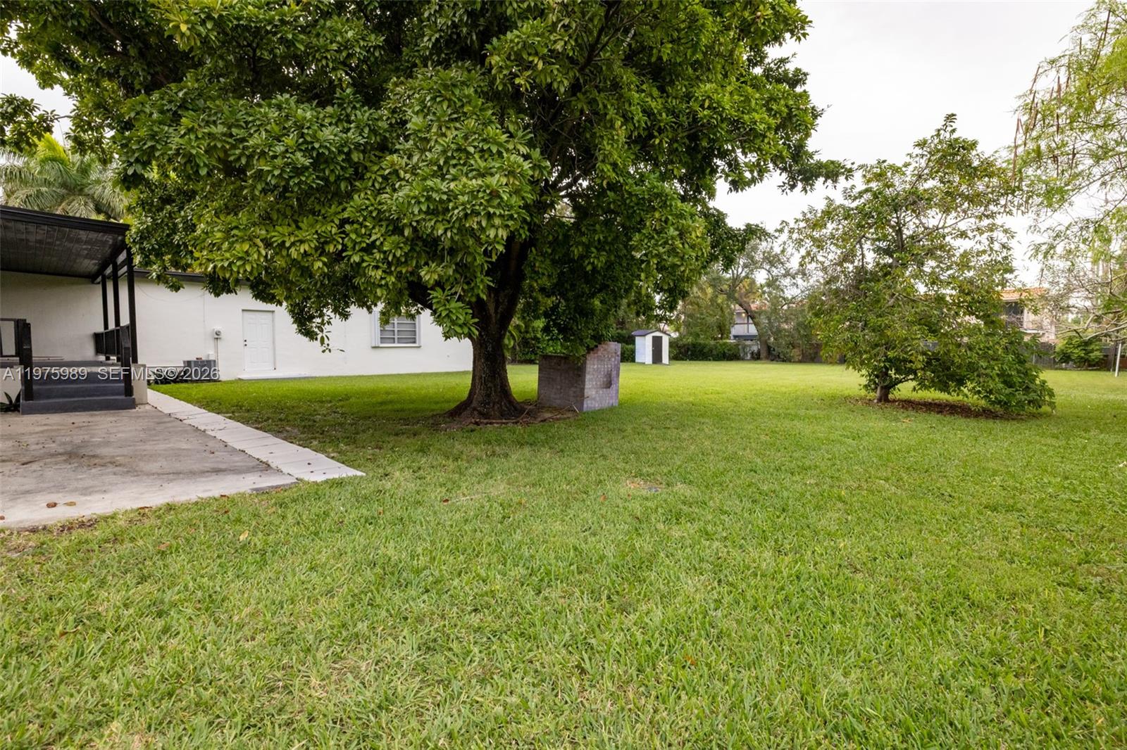 3401 Southwest 17th Street, Unit 3401 Miami, FL 33145 - Photo 15 of 69 a view of an outdoor space and a yard