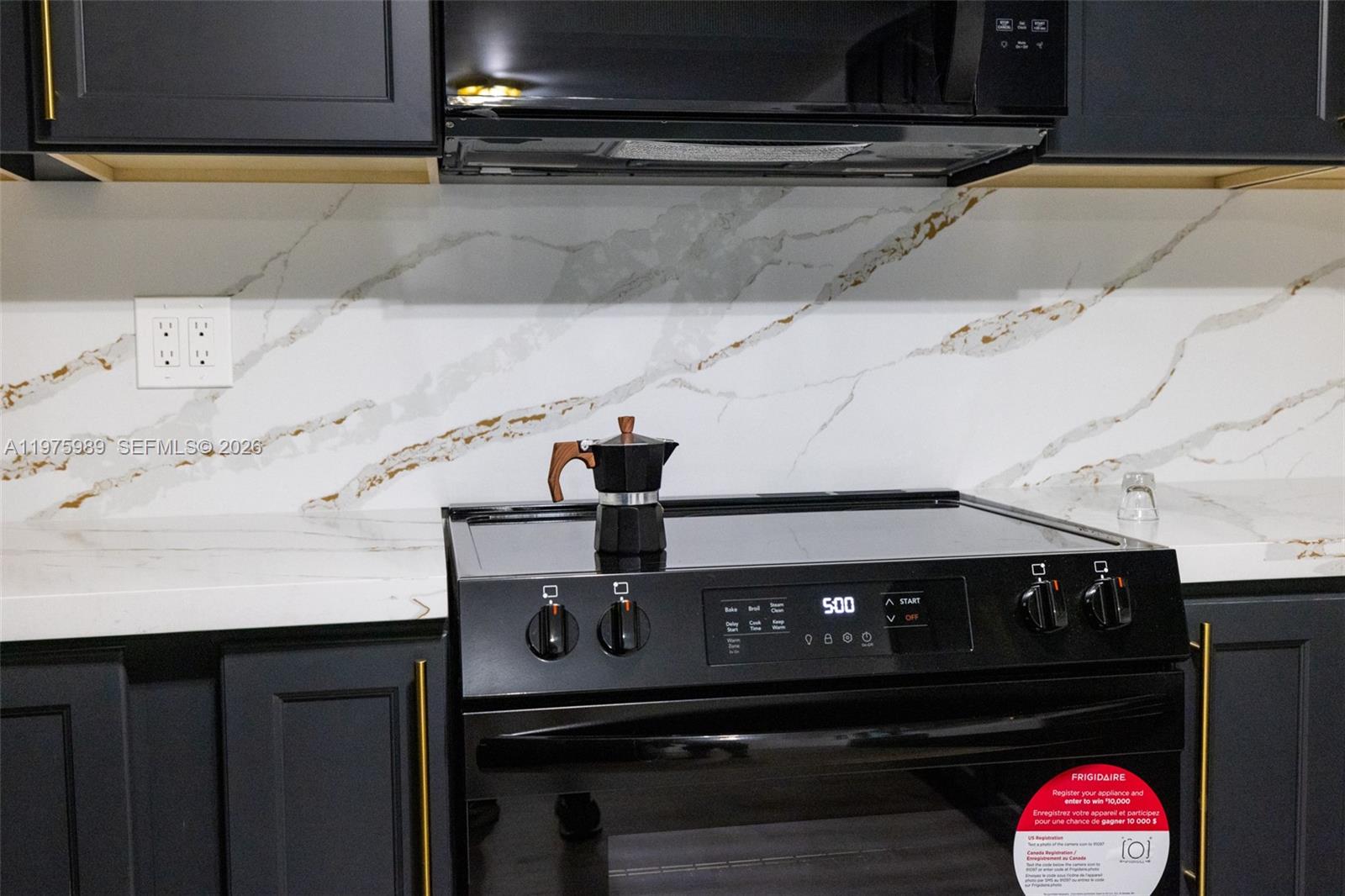 3401 Southwest 17th Street, Unit 3401 Miami, FL 33145 - Photo 26 of 69 a close view of stove